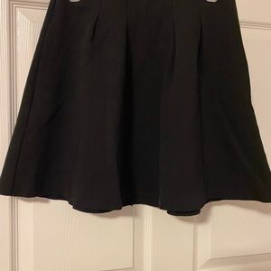 Black mini flare skirt